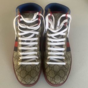 Gucci high tops.   Brand new.  Worn once.  Perfect condition.